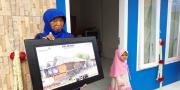 Senyum Lepas Warga Tangerang Setelah Rumahnya Dibedah AP II